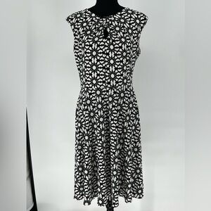 WISP GEOMETRIC KEYHOLE BODICE‎ WHITE DRESS BLACK DESIGN WITH BLUE ACCENT.